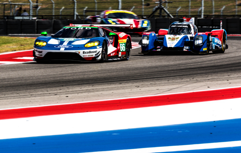 The SMP Racing LMP2 car navigates around a couple GT cars. Photo credit: Kurt Bradley